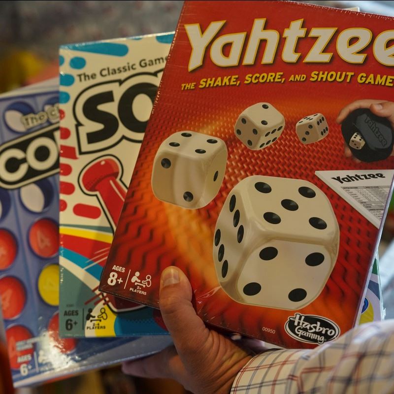 Board games from donation drop-off for holiday toy drive