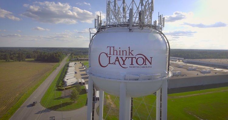 "Think Clayton" written on a water tower